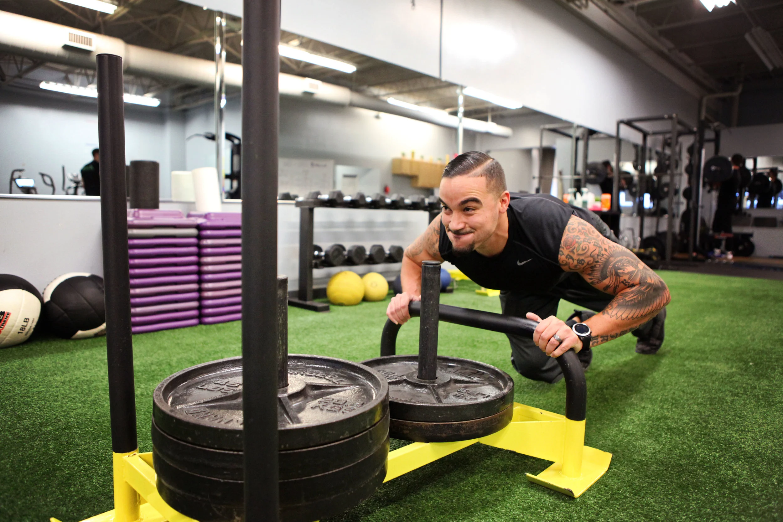Brian pushing some "light"weight on the sled
