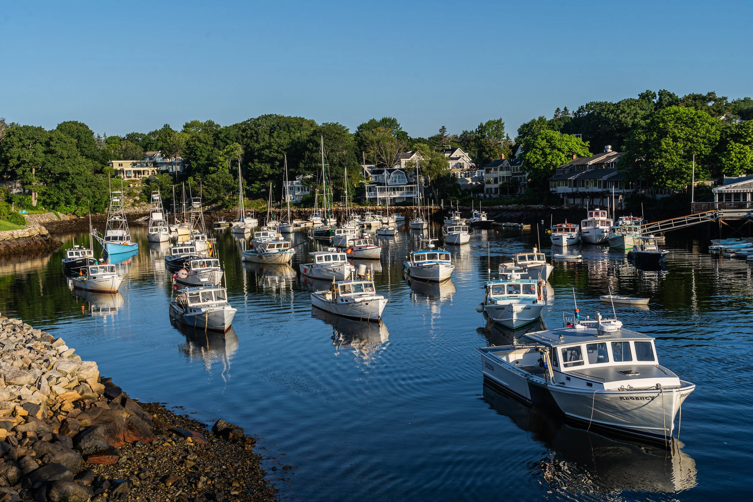 Fishing boats moored in Perkins Cove harbor in Ogunquit, Maine