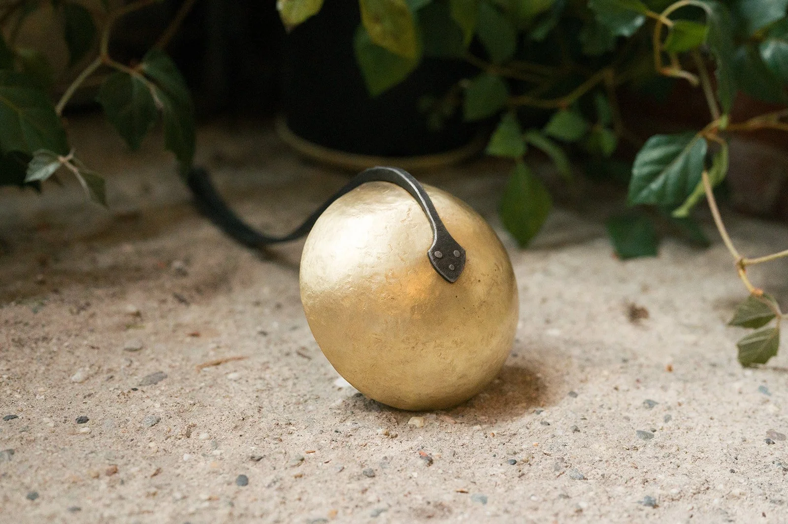 Formed brass and forged iron handle