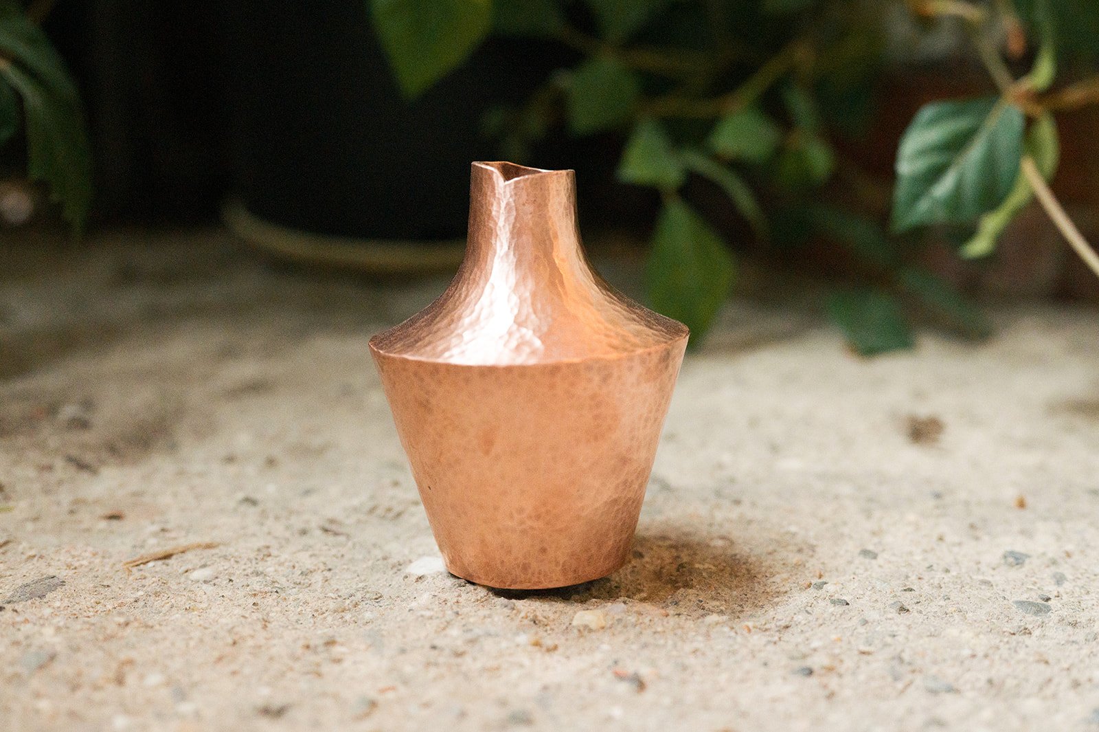 Raised copper vessel