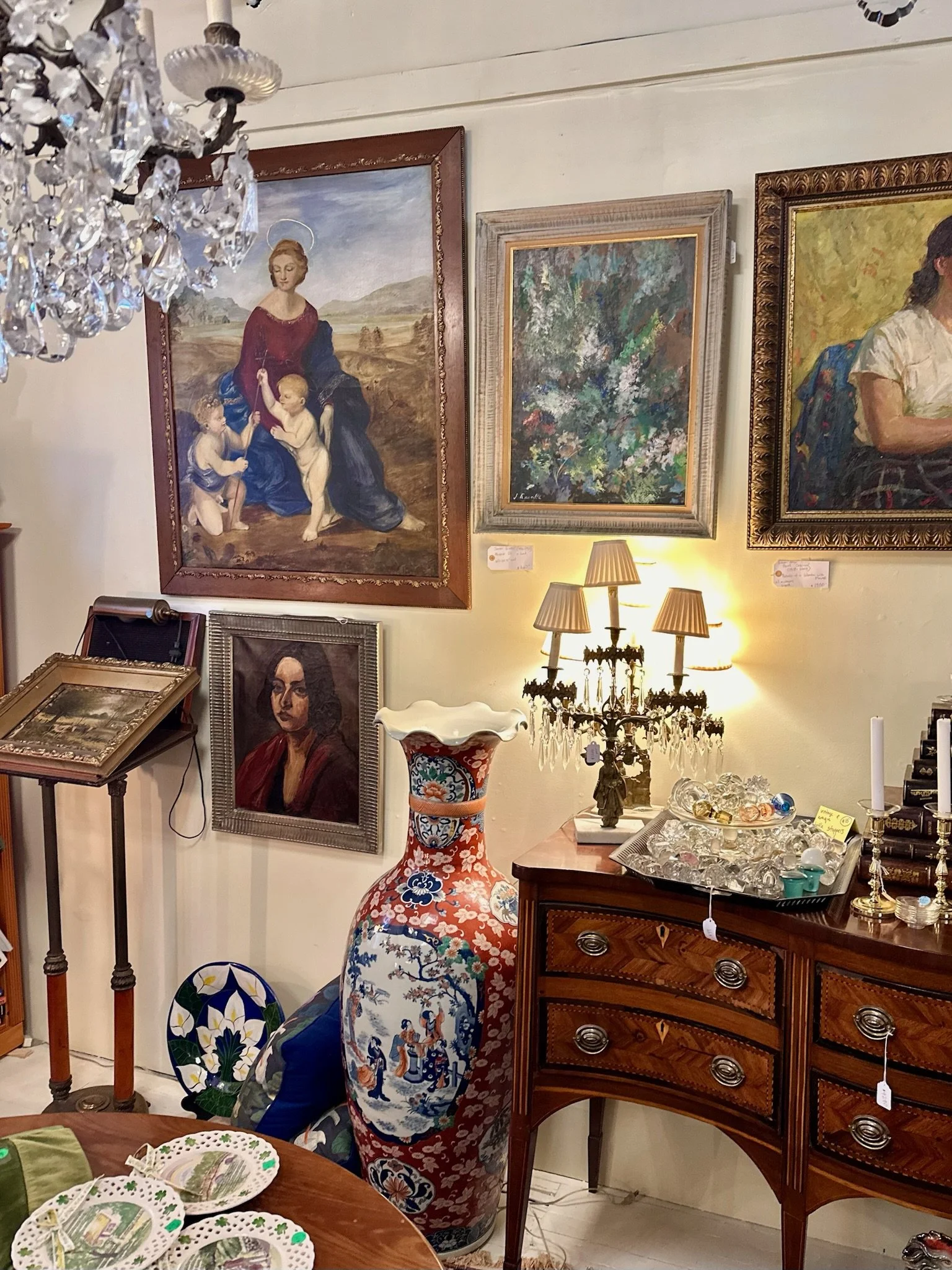 Oil paintings for sale on consignment displayed inside Villa Vintiques in Woodbury, Connecticut on Main Street N. on the Connecticut Antiques Trail.