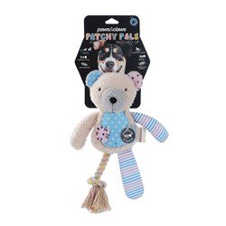 Dog-themed plush toy with a rope and tassel, packaged in a black cardboard backing.