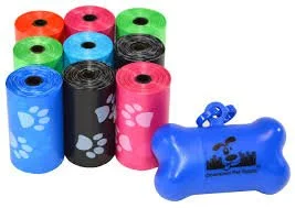 Poop Bags in blue, black, pink, green, gray, and red colors with paw print designs, along with a blue dog bone-shaped toy dispenser.