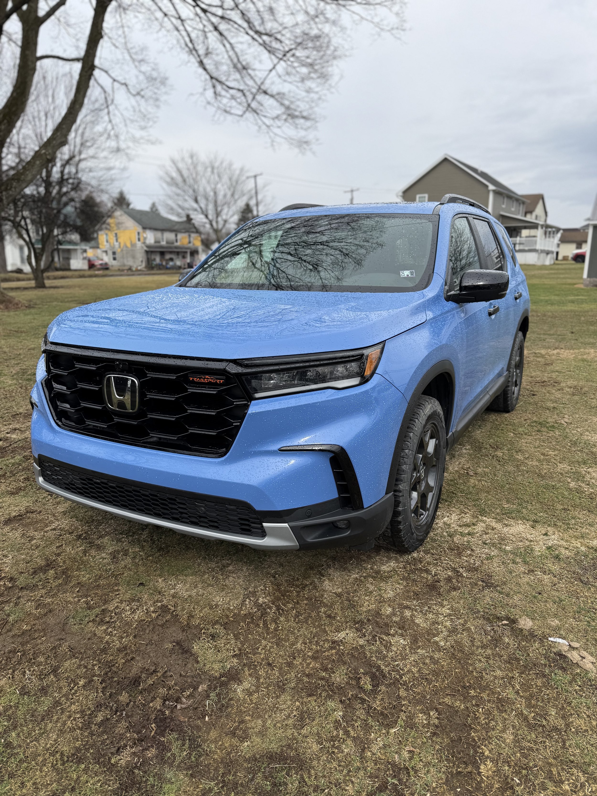 Blue Honda receiving mobile full detailing service at customer location