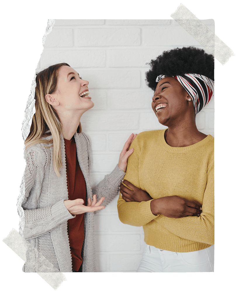 2 young women chatting and laughing together