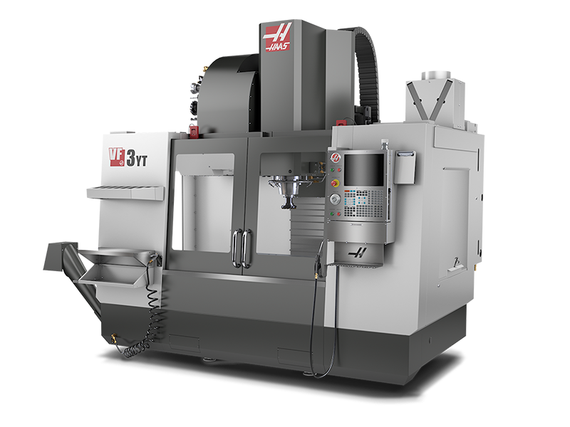 A CNC machine tool used for precision manufacturing, labeled 'VF 3YT' with a control panel and a working table.