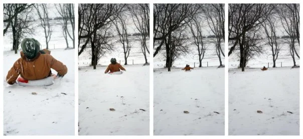 A collage showing a progression of sledders going down a large hill