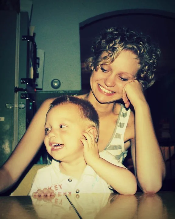 Mother and son at a kitchen table