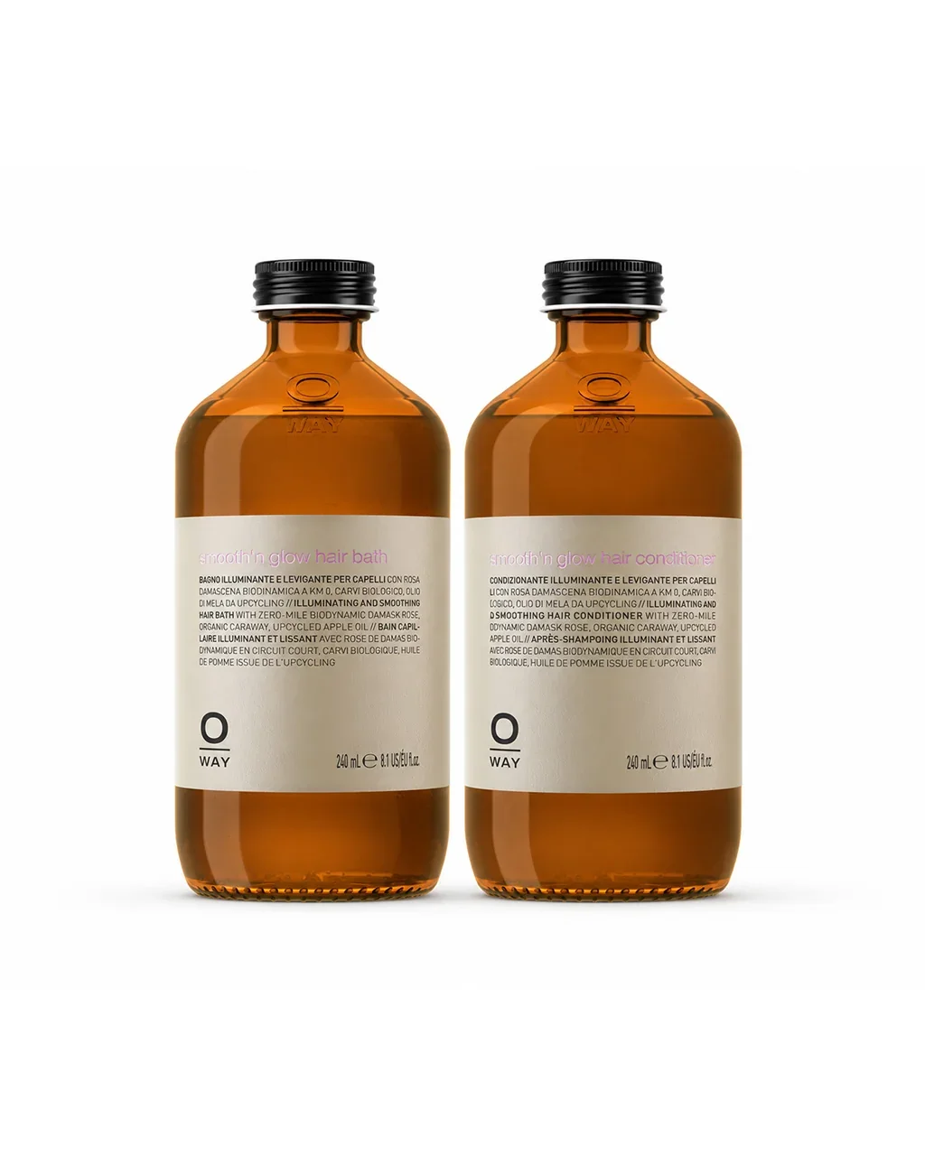 Two amber glass bottles of hair care products with white labels and black caps, labeled 'Smooth n Glow Hair Bath' and 'Smooth n Glow Hair Conditioner.'
