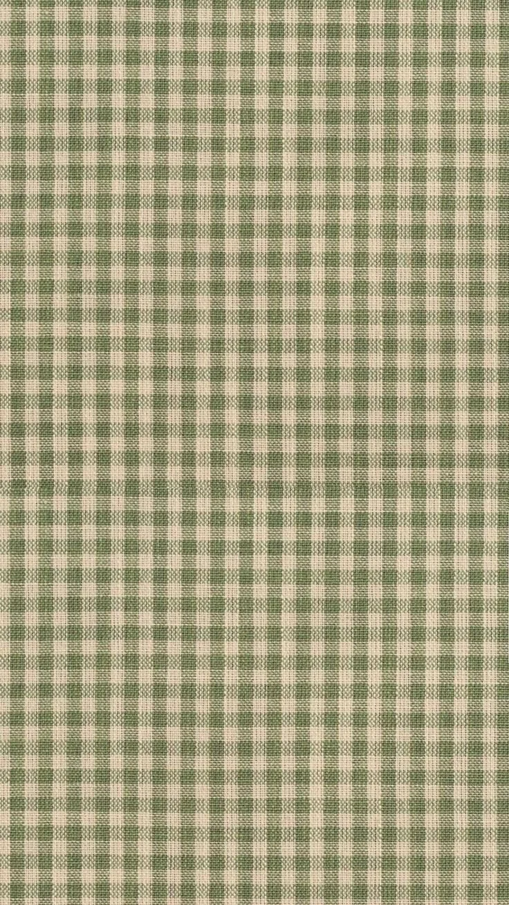 Green and beige plaid fabric pattern.