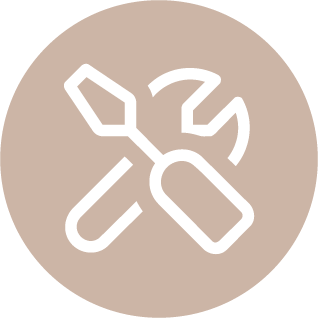 Icon of a crossed screwdriver and wrench on a beige circular background.