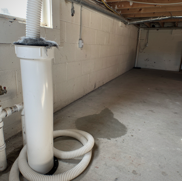 washer discharge hose emptying into overflowing standpipe drain