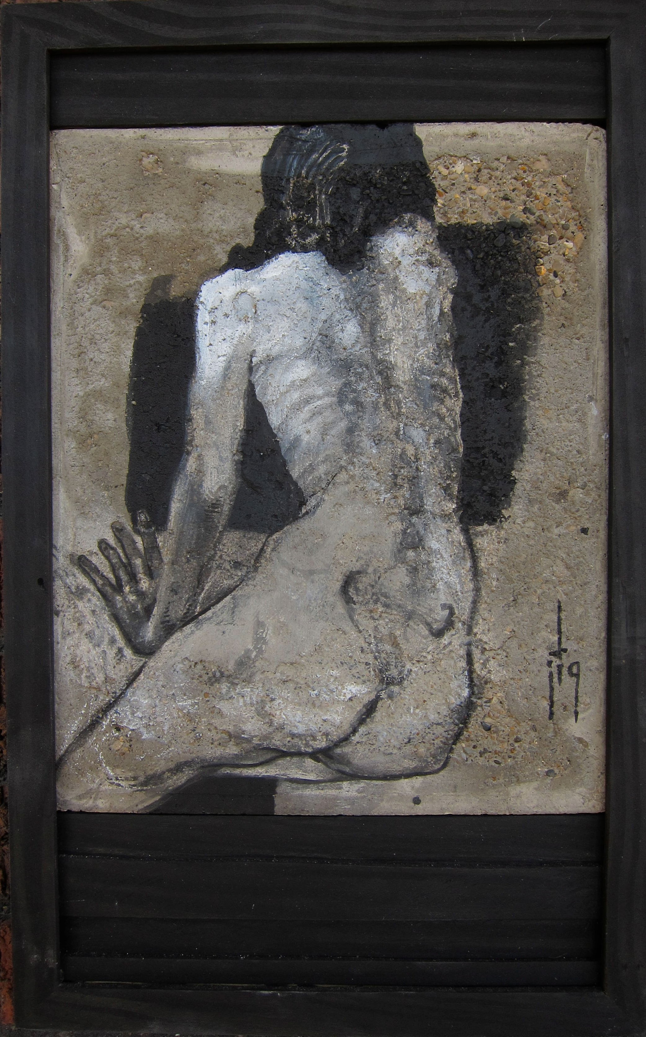 A black-and-white mixed media artwork of a person with long hair and a muscular back, kneeling on the ground with one hand on the ground and the other hand spread out.