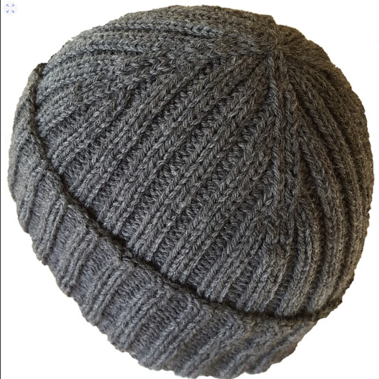 A grey hand-knit beanie in 2x2 rib on a white background