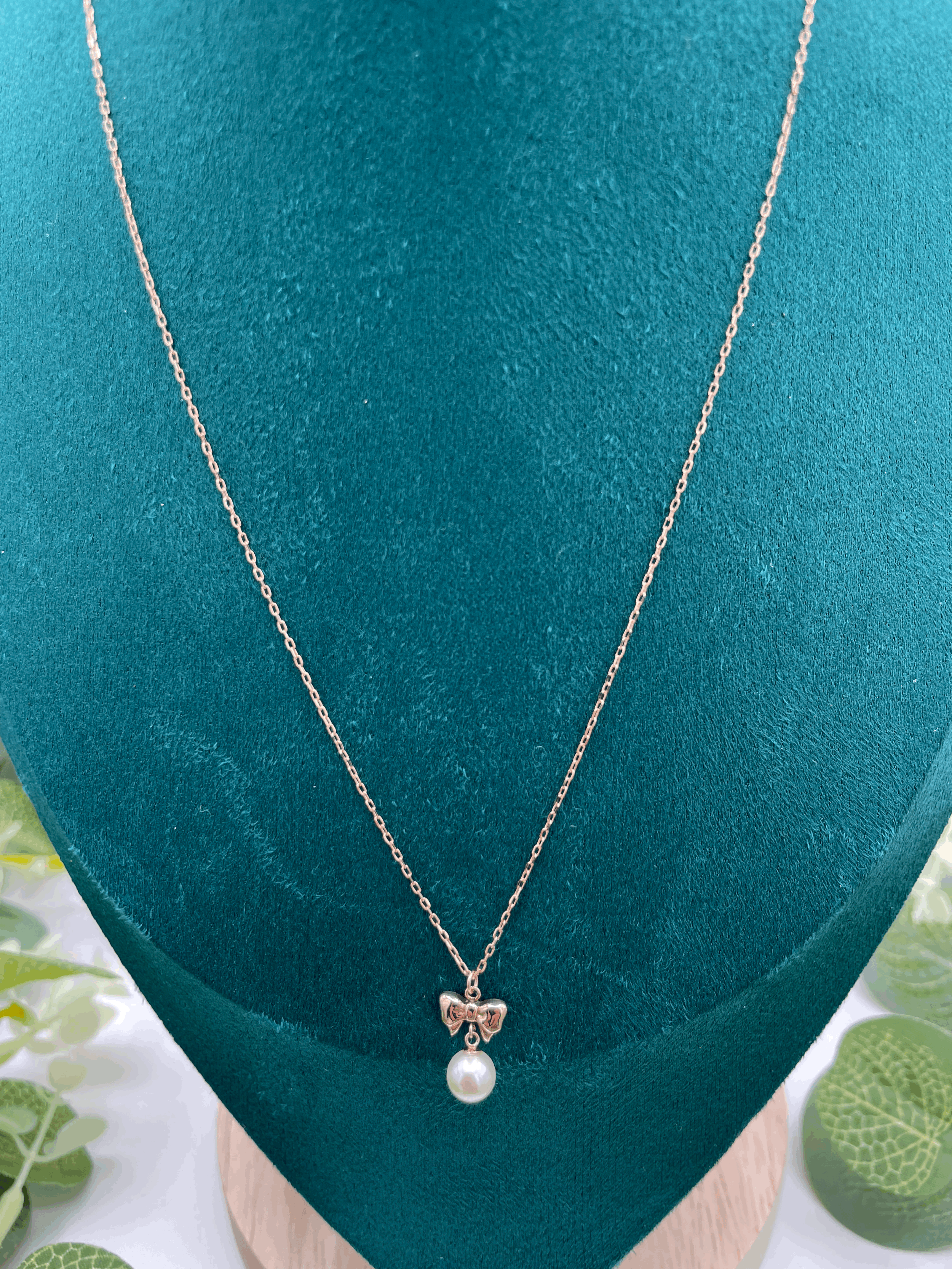 Pearl Bow Pendant Necklace in 10k Rose Gold