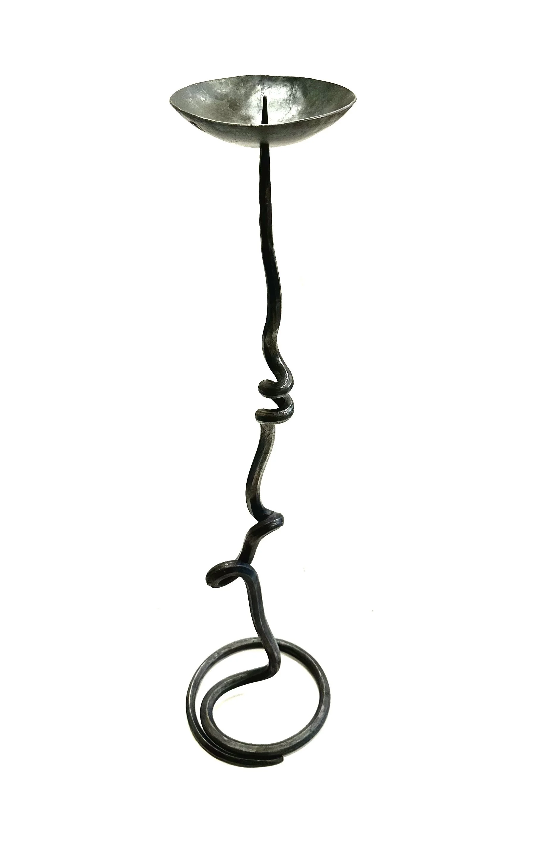 A metal stand with a circular, bowl-shaped top and a wavy, spiral metal pole extending downward to a circular base.