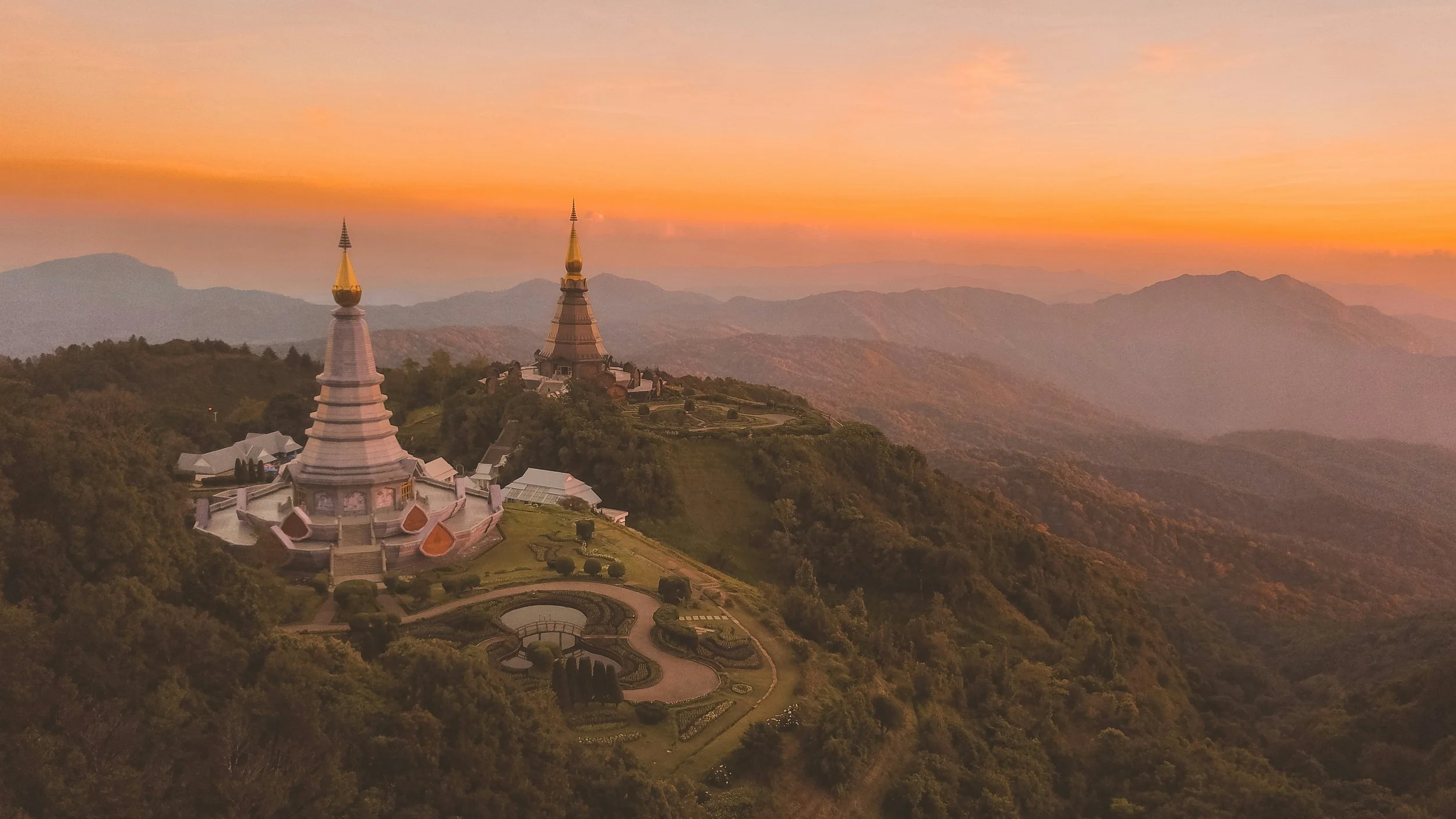 A mountain road in Chiang Mai, Thailand, bathed in golden hour light