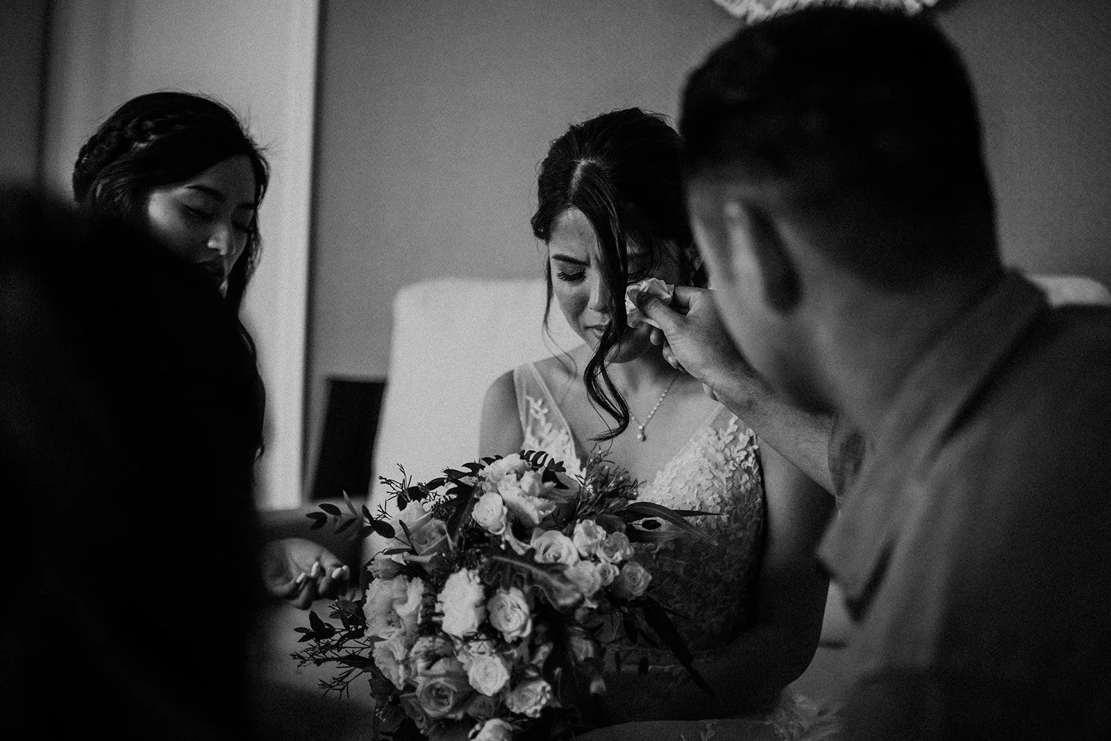 Bride in prayer before wedding ceremony — intimate getting ready moment by Weddings by Qay