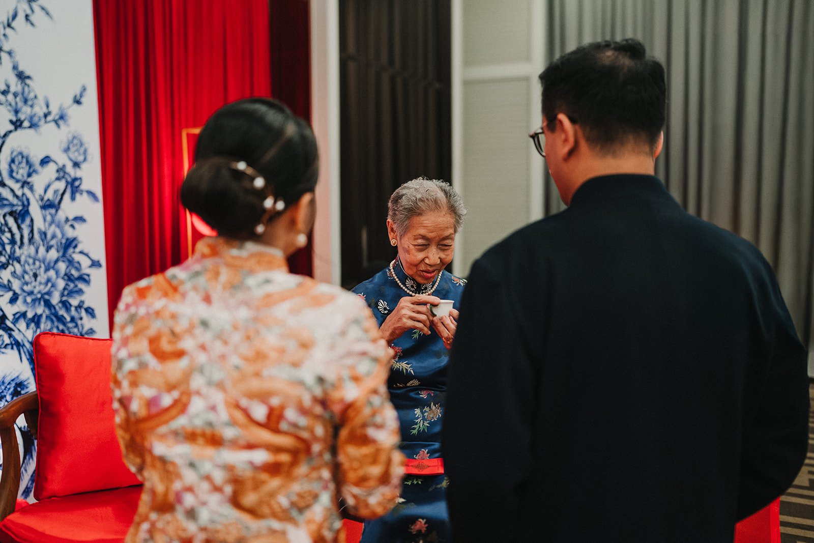 Bride and groom presenting tea to elders — Chinese tea ceremony by Weddings by Qay