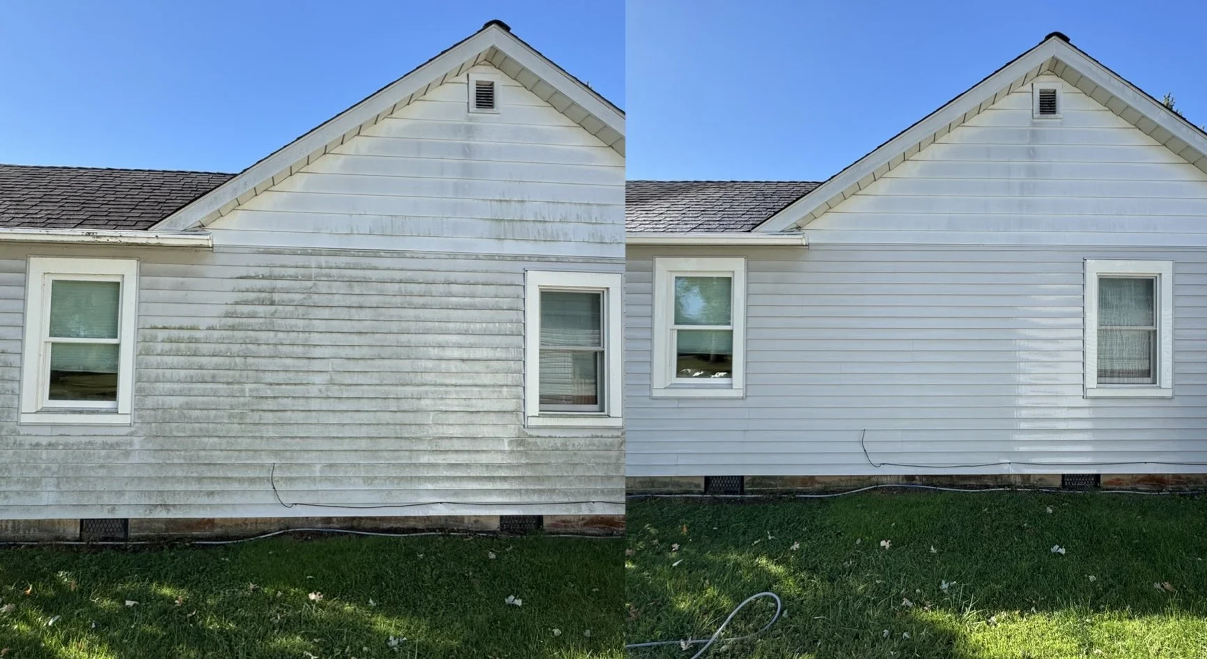 Comparison of a house's exterior before and after cleaning, showing a side with dirty, moldy siding on the left and cleaned, bright siding on the right, with two windows, a grassy yard, and a clear blue sky.