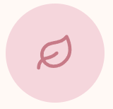 Simple line drawing of a leaf on a pink circular background.