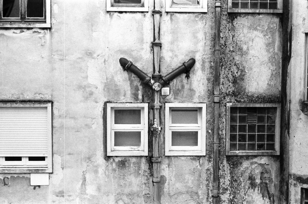 Drains, windows in laneway
