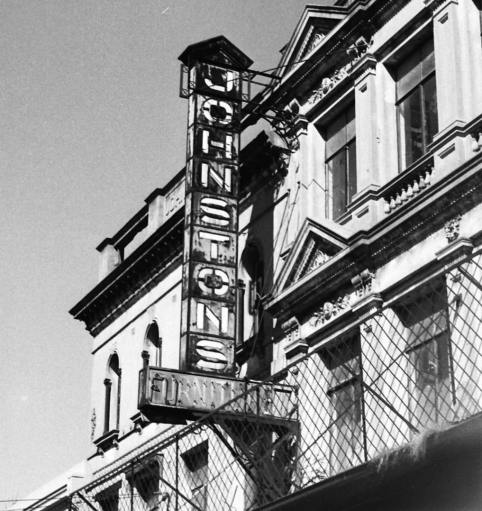 Johnsons neon signage still sitting proudly looking down on Gertrude St, Fitzroy.