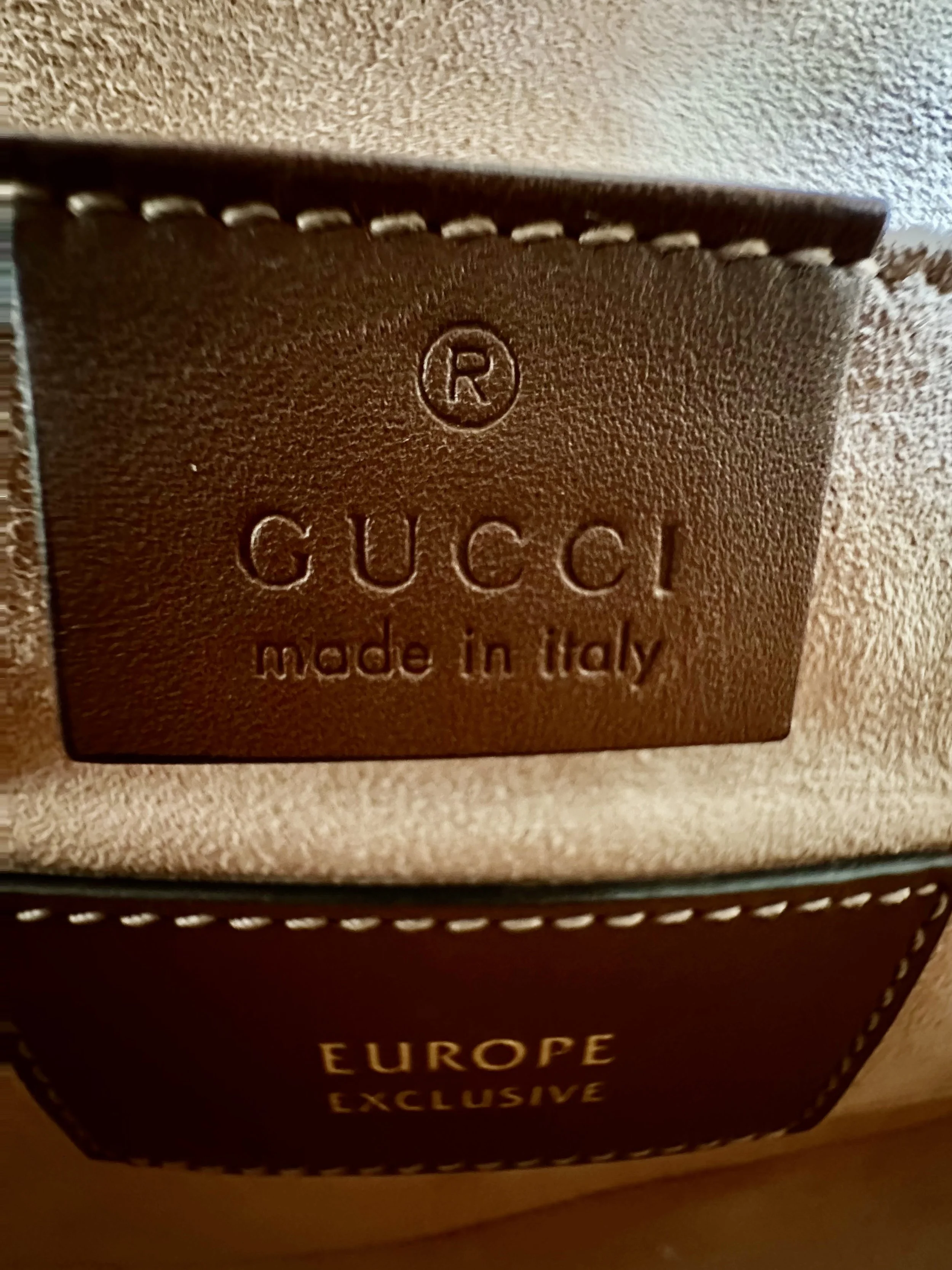 Gucci interior tag, Made in Italy authentication stamp