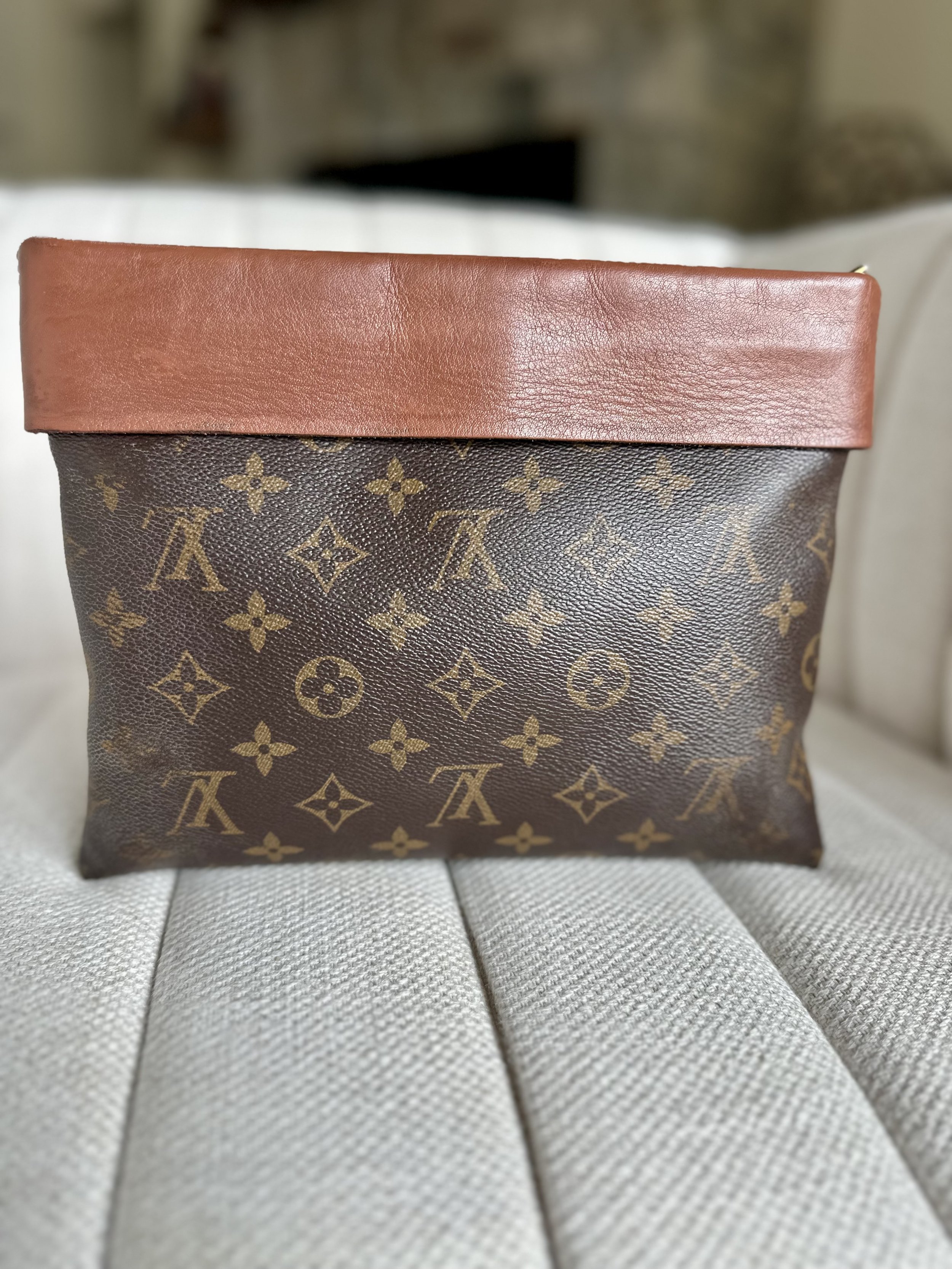 Louis Vuitton Tuileries Pochette vachetta fold-over top detail
