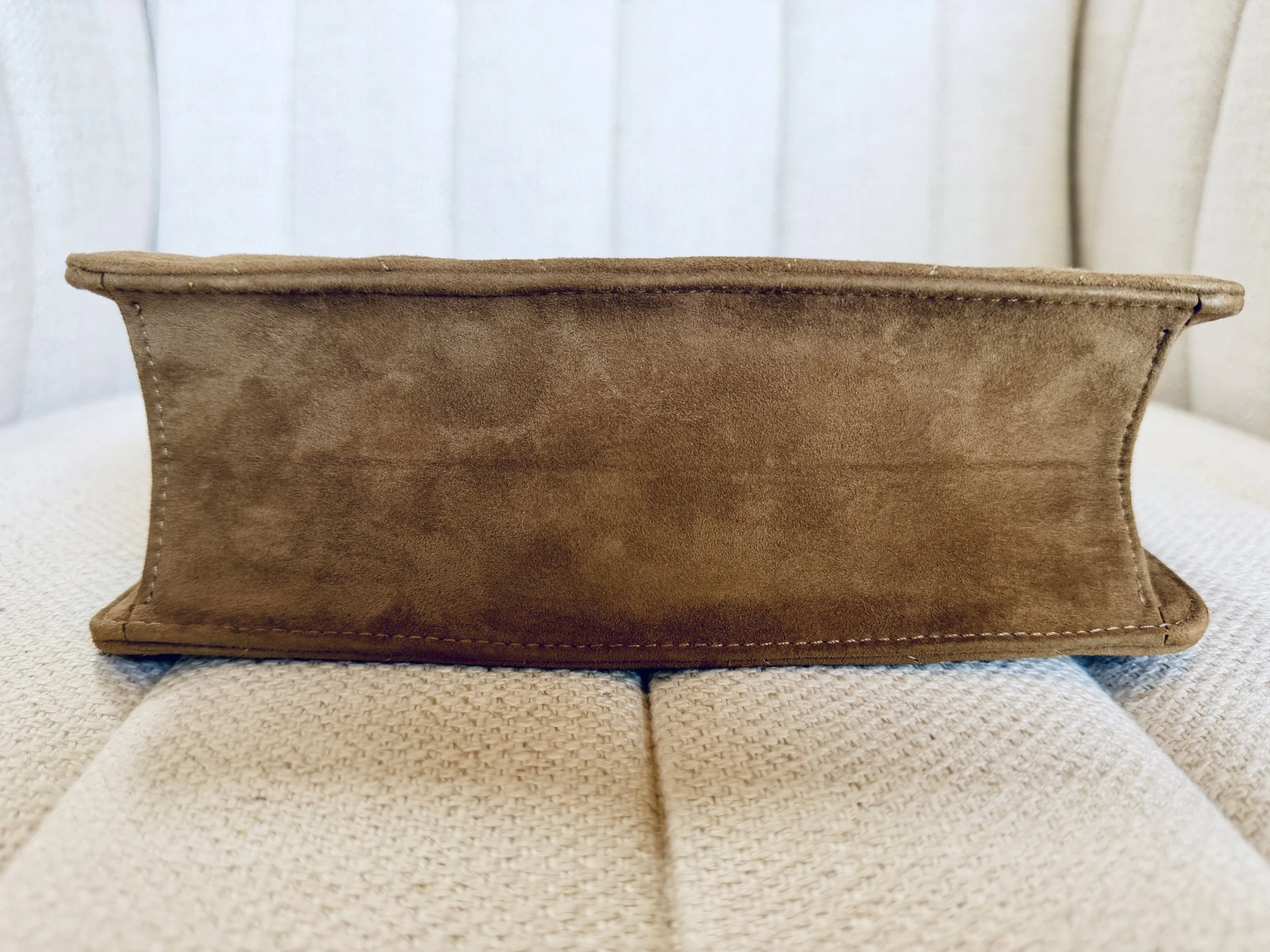 Chanel suede bag base view, structured silhouette
