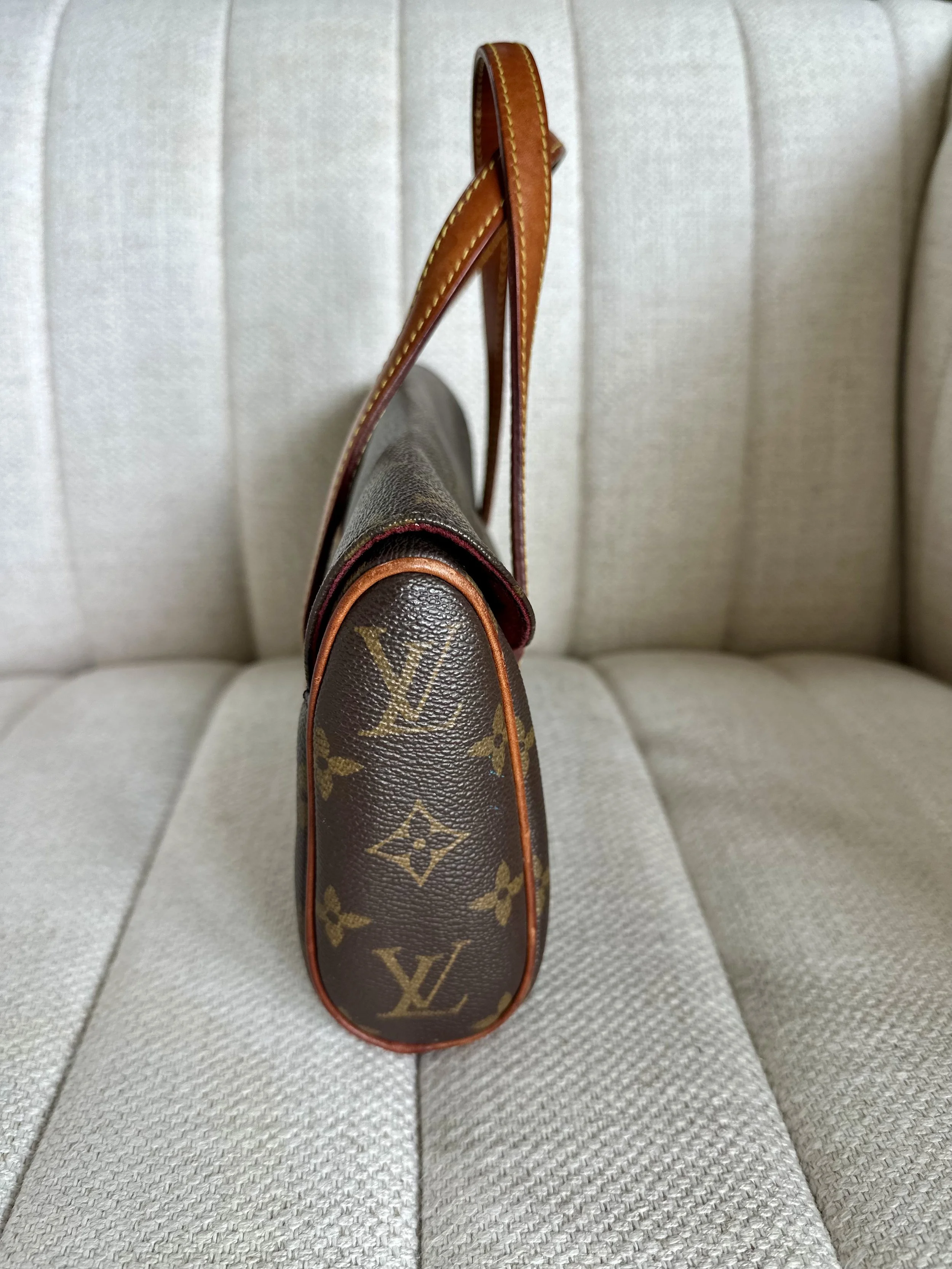Louis Vuitton Sonatine side view, snap closure
