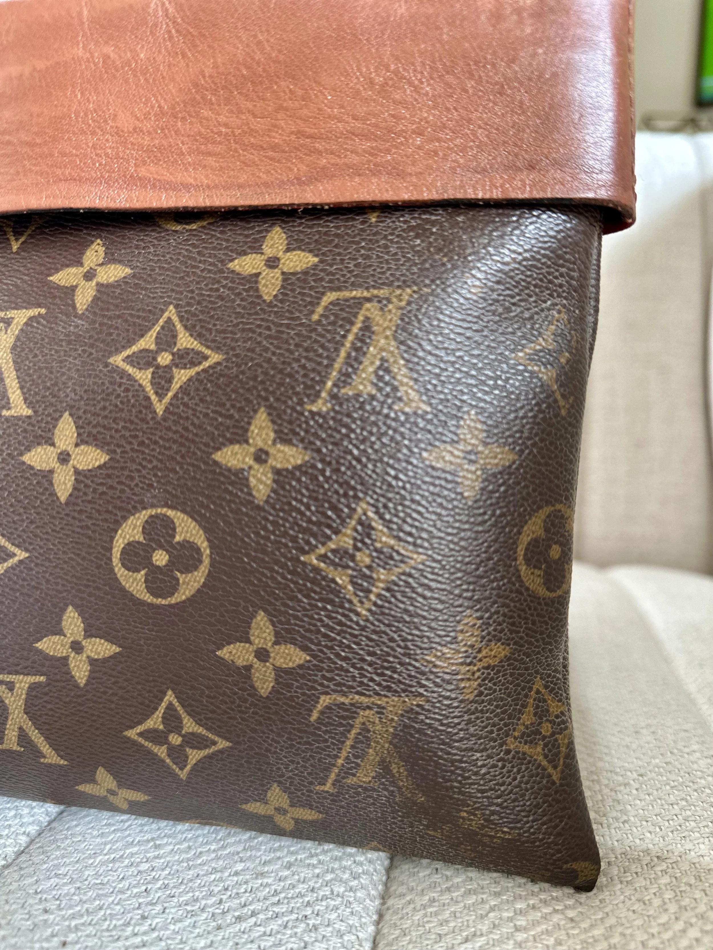 Louis Vuitton Tuileries Pochette embossed Paris stamp close-up