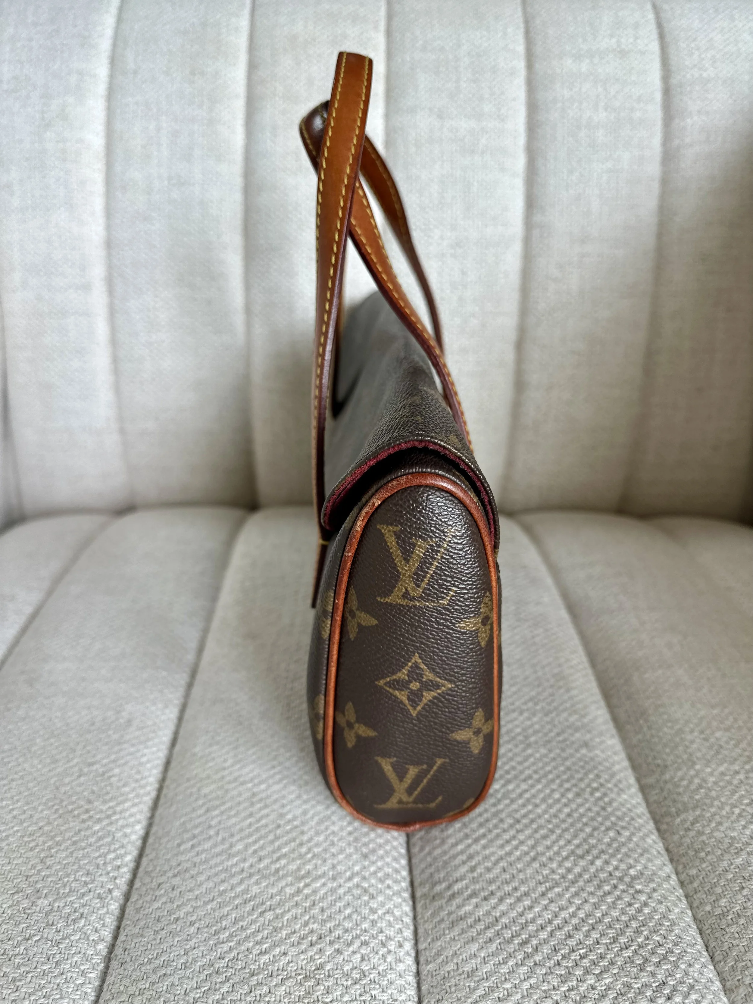 Louis Vuitton Sonatine side view, snap closure