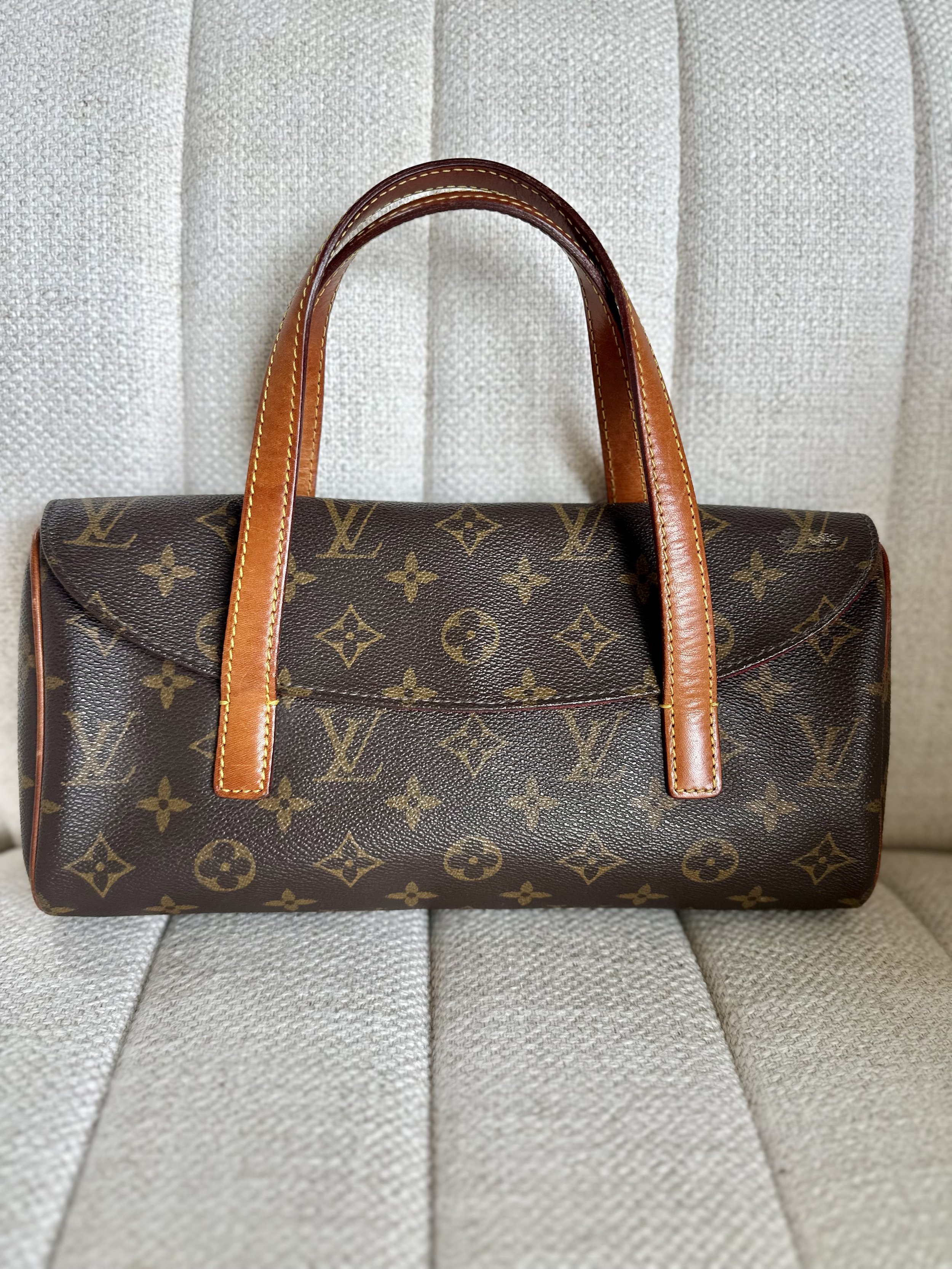 Louis Vuitton Sonatine front view, Monogram canvas barrel bag