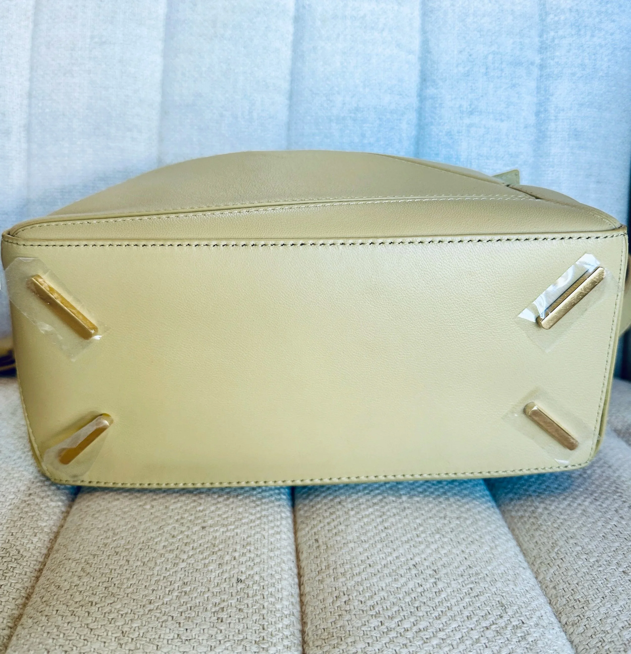 Loewe Puzzle bag base view, protective hardware stickers