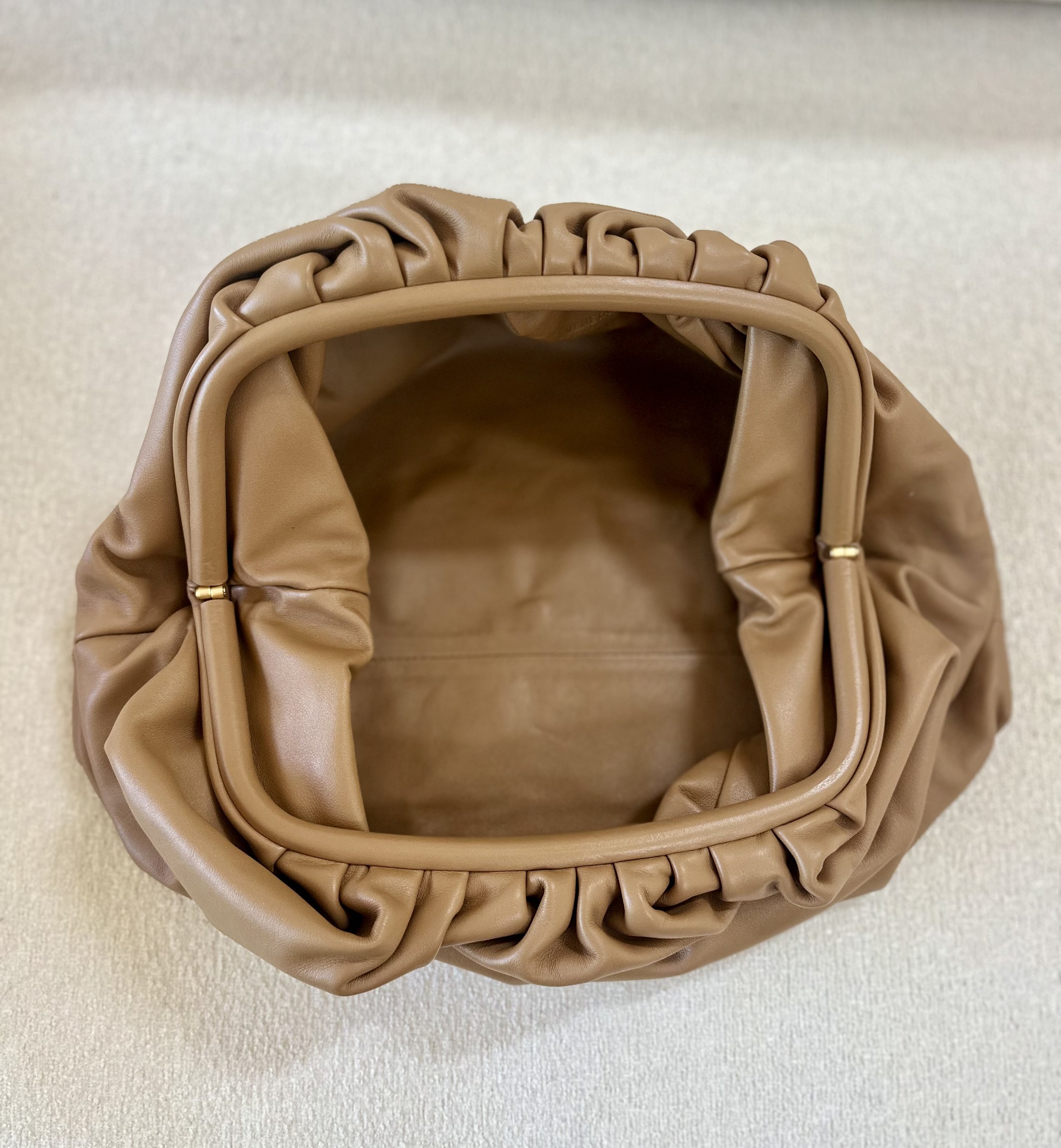 Bottega Veneta The Pouch interior open view nude camel calfskin magnetic frame closure