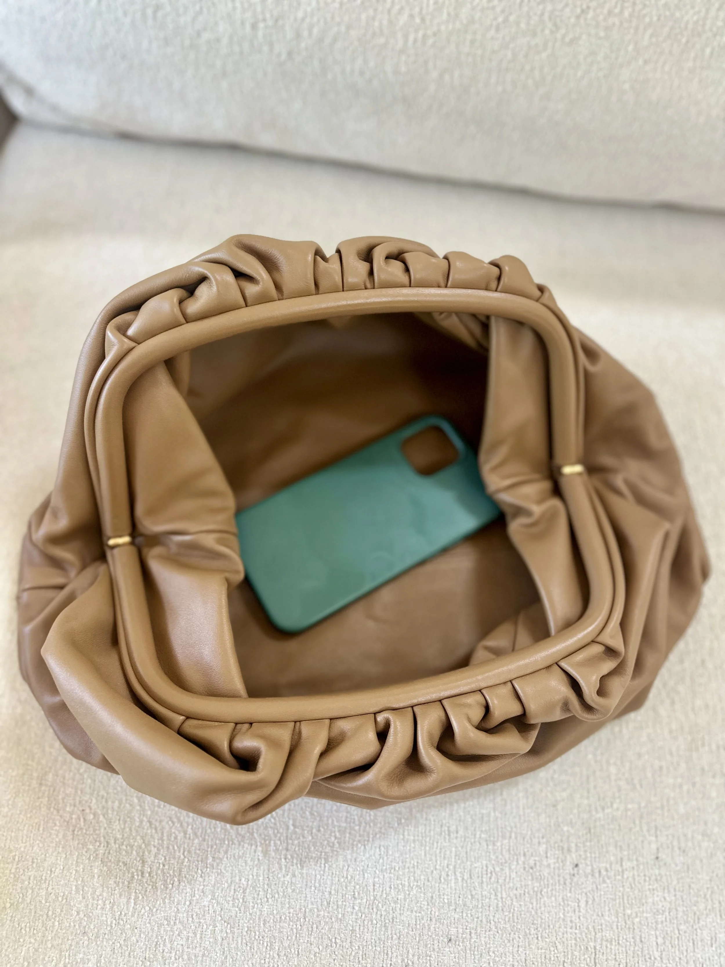 Bottega Veneta The Pouch size reference open interior nude camel