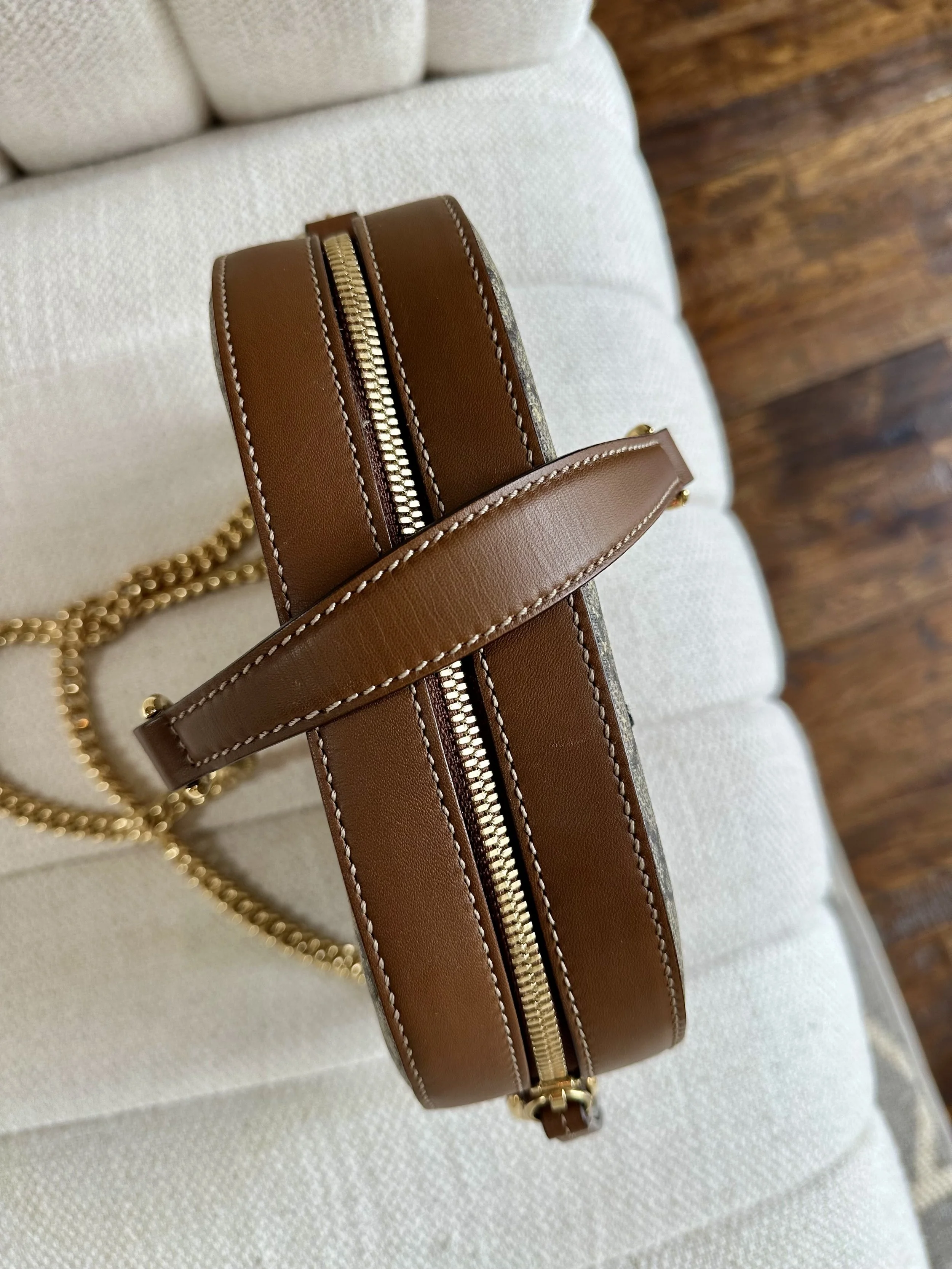 Gucci Bee bag side view, cognac leather trim and zipper