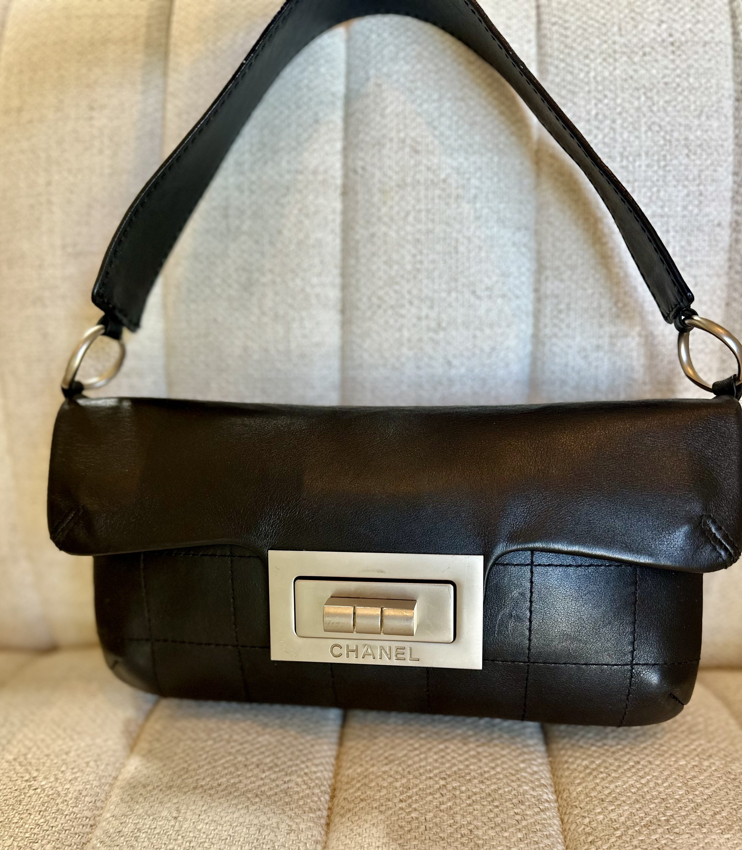 Vintage Chanel Mademoiselle shoulder bag black lambskin silver hardware shoulder strap