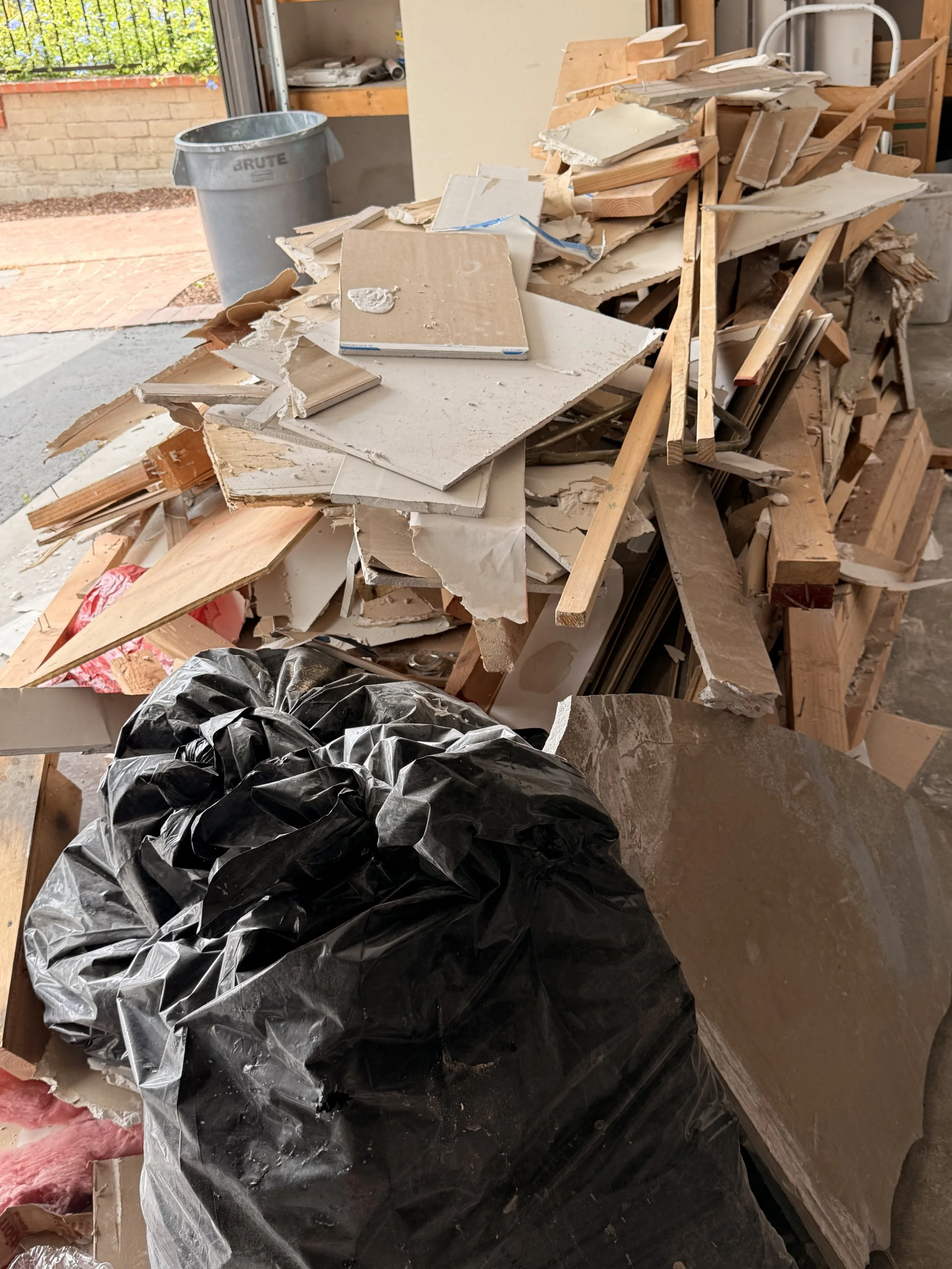 Well Done Junk Removal doing a clean up in La Crescenta, Ca