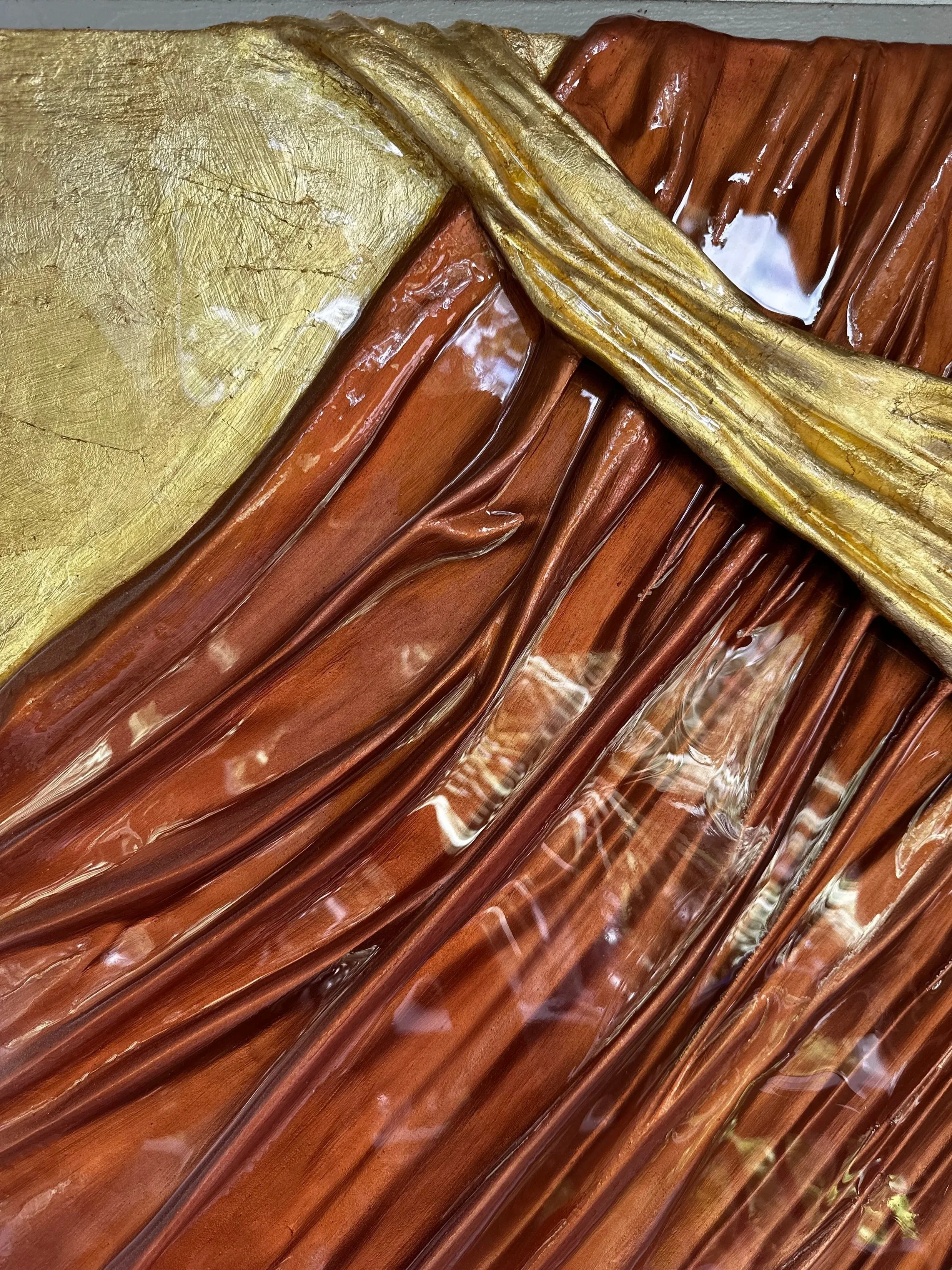gold leaf sculptural art piece, coated in resin