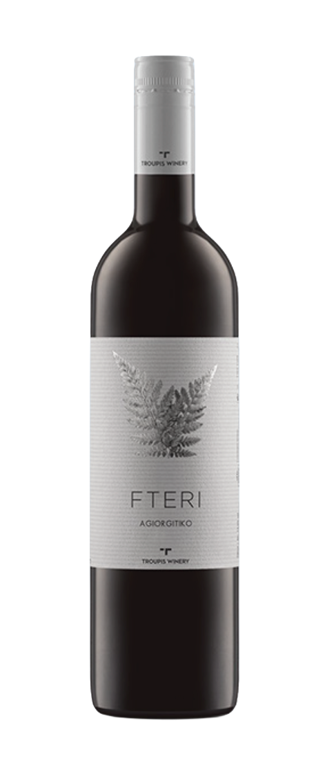 A bottle of Fteri Agiorgitiko red wine from Troupis Winery against a light blue background.