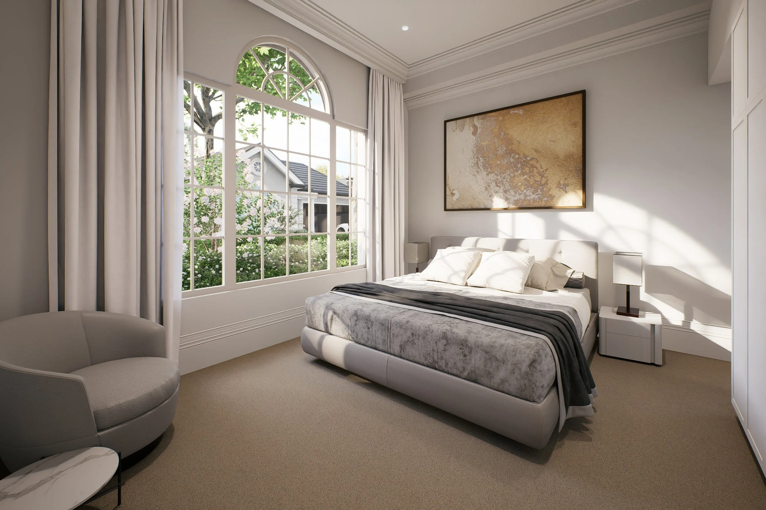 A bedroom with a large window with white curtains, a white bed with gray bedding, two nightstands with lamps, a beige armchair, a large art piece on the wall, and natural sunlight illuminating the room.