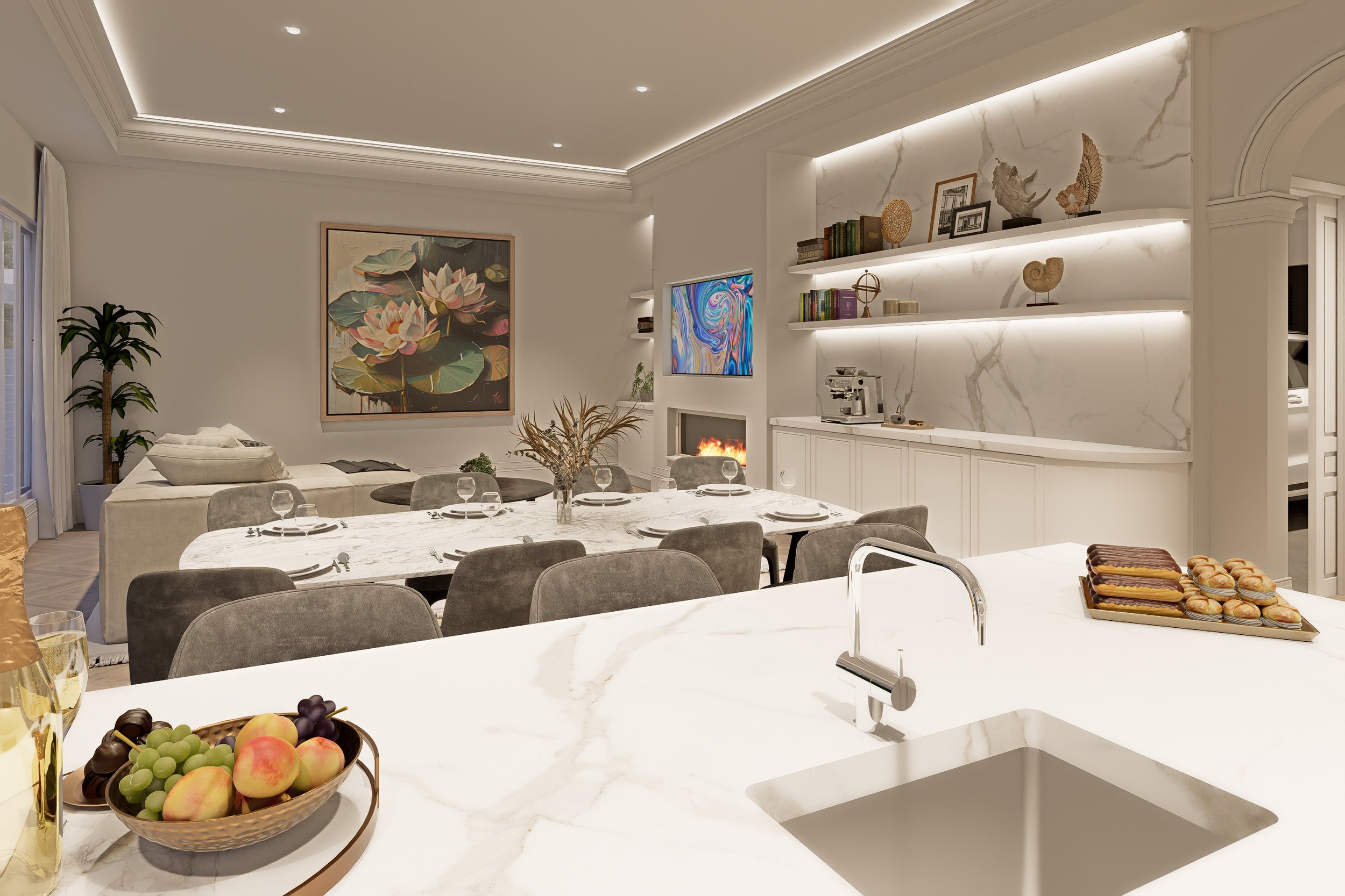 Modern living and dining area with white marble countertops, a bowl of fruit, glasses of champagne, a fireplace, wall art, built-in shelves with decorative objects, plants, and a dining table set for a meal.