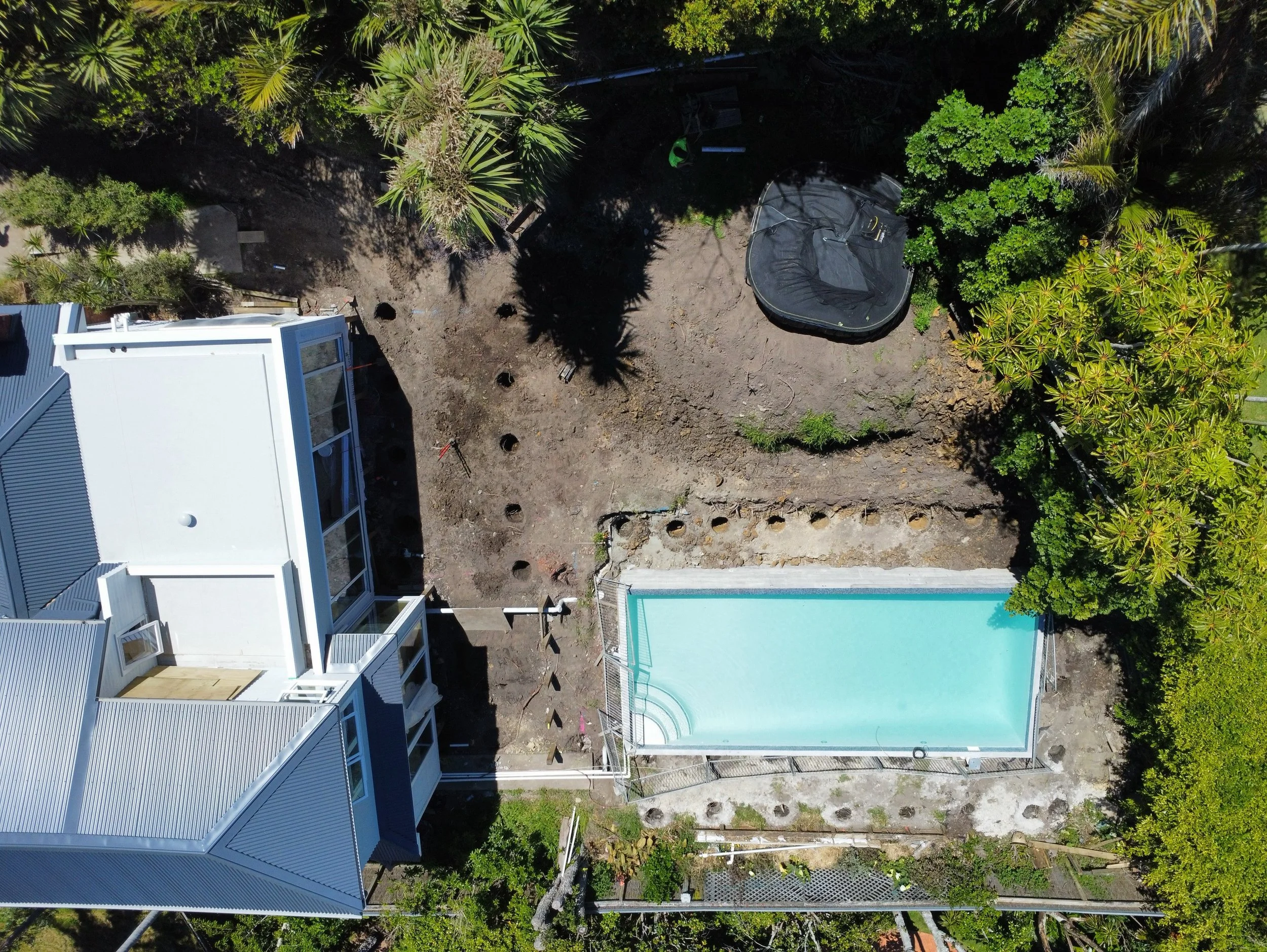 Time for a refreshing afternoon beverage ! 
We have completed the task of drilling all the holes for the deck and retaining wall around this amazing pool for the team from @eyefordetail_nz at their beautiful Belmont renovation. 
Now time to enjoy a l