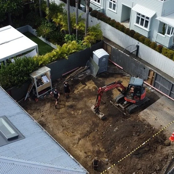 Siter scrape being done before footings are dug, then pool dig