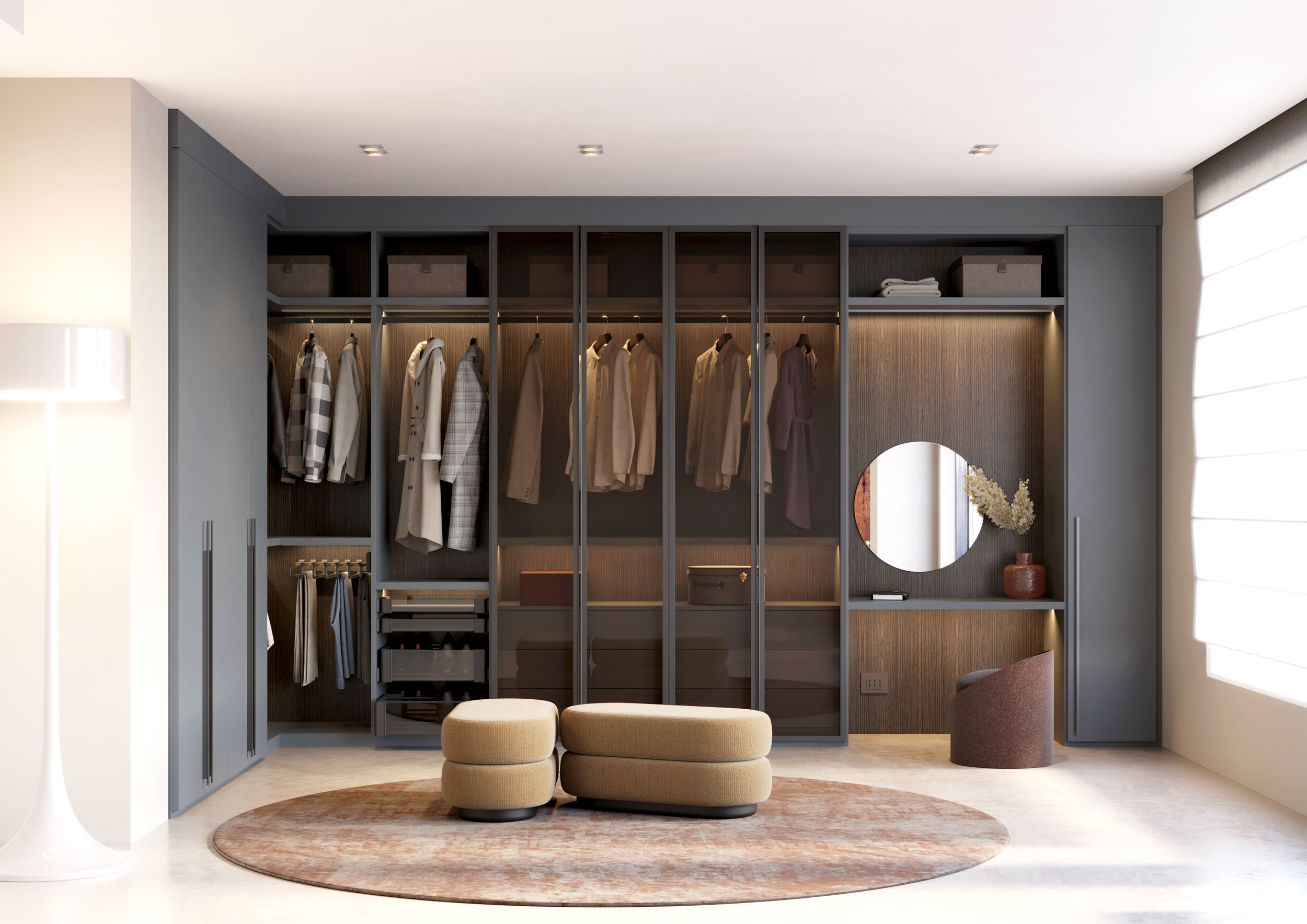 Modern walk-in closet with hanging shelves and drawers, beige ottomans, a round rug, and a mirror on the wall.