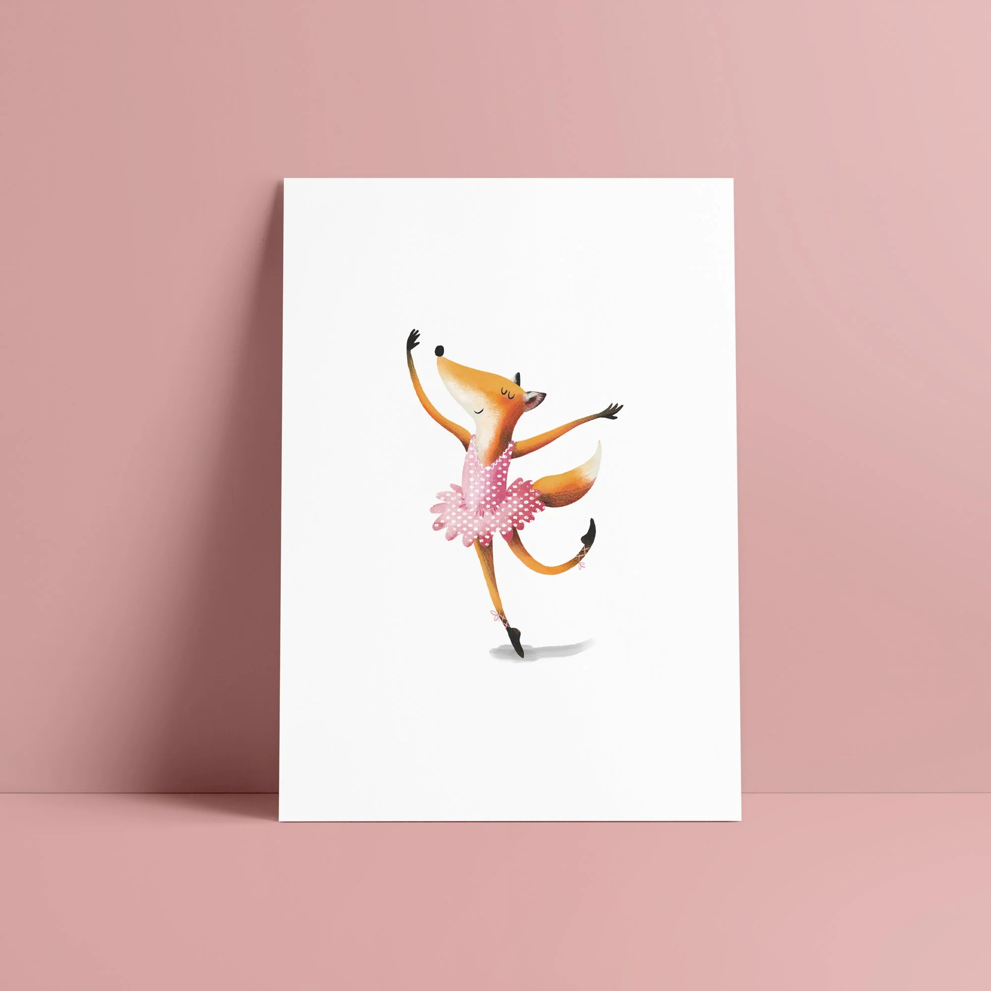 A fine art giclee print with an illustration of a dancing fox wearing a pink tutu, placed on a pink background.
