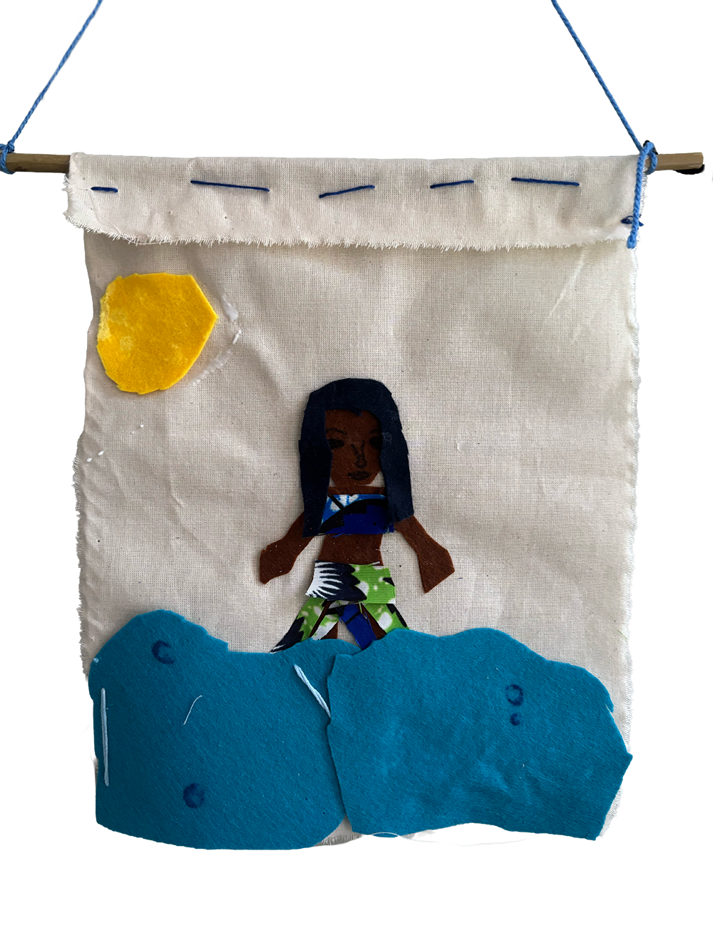 Felt art depicting a woman in beachwear standing on a blue whale with the moon in the sky.