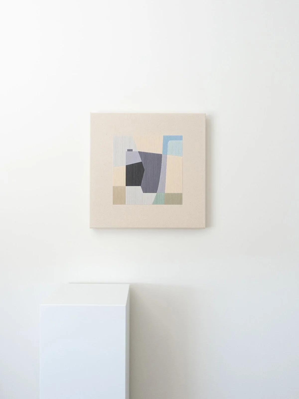 Front view of Levels (50x50cm) cotton thread abstract artwork with a pedestal by Kateryna Chernetska.